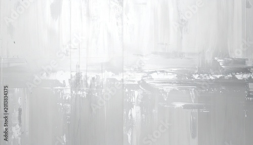 Abstract grey wall background with artistic white brush marks.