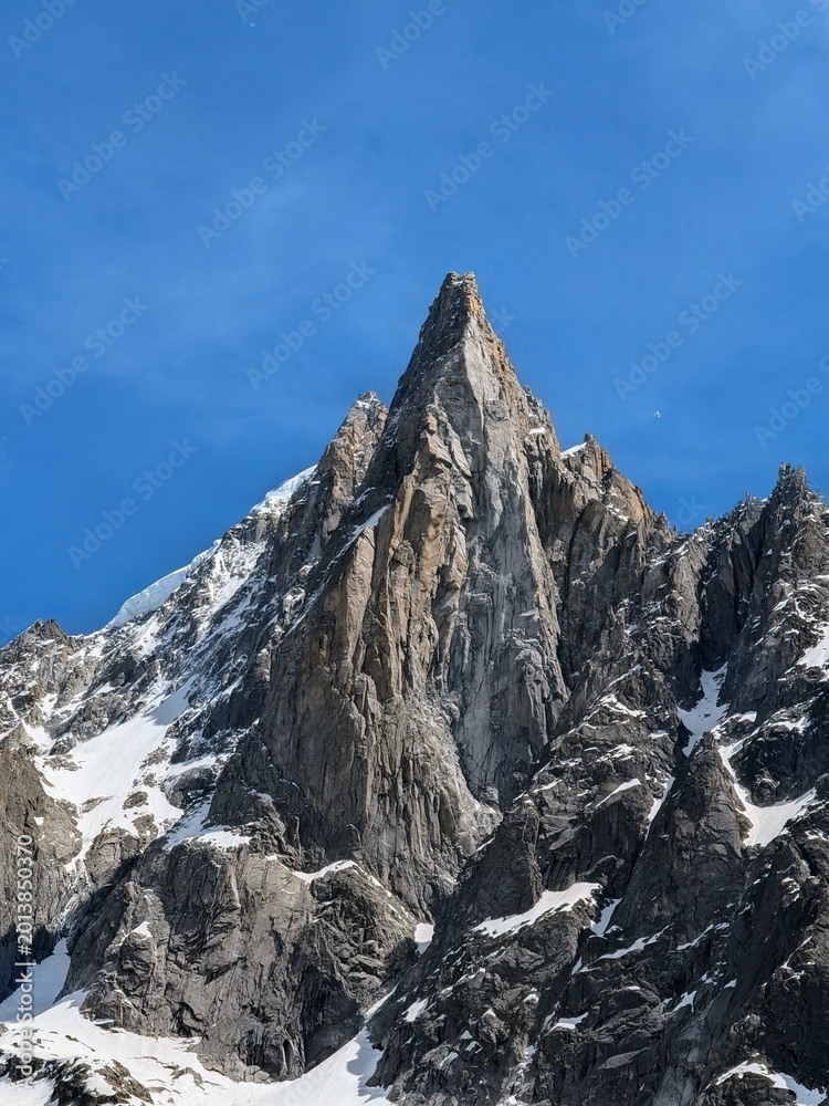 Obraz premium Aiguille du Dru dramatic granite peak above Mer de Glace Chamonix with copy space