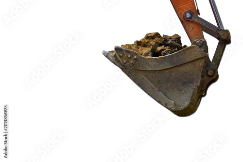 Bucket.Loading road debris with an excavator into dump truck
