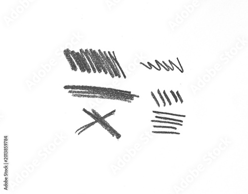 Collection of messy pencil doodles and graphic strokes isolated on white