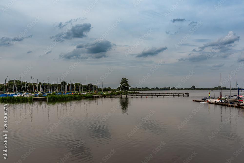 Fototapeta premium Boats in Olgahafen on Lake Dümmer, Lower Saxony, Germany
