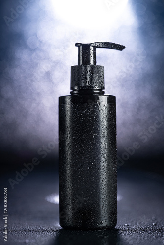 Luxury Black Cosmetic Product Mockups on Geometric Pedestals with Abstract Background