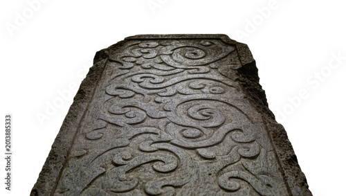 Tableau sur toile Isolated ancient stone carving featuring intricate swirling patterns and weather