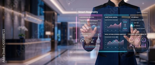 Person interacting with a smart hospitality dashboard in a modern hotel lobby