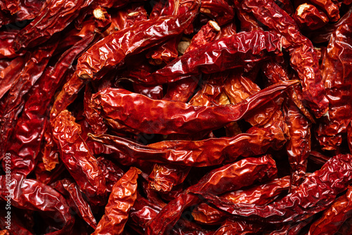 Pile of dried red bird's eye chilies, Thai food ingredient, Top view