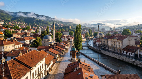 Panoramic view of Sarajevo's historic Baščaršija district with the Miljacka River flowing through the city.