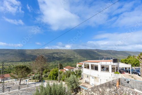 Slika na platnu Panoramic View of Mira de Aire Village and Green Hills in Central Portugal