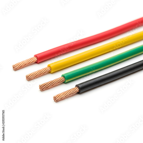 Four colored electrical wires with exposed copper strands isolated on white background