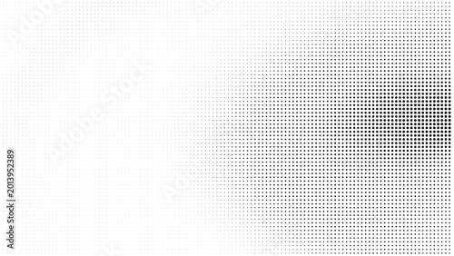 Tableau sur toile Halftone pattern with gradual from dense to sparse dots black and white graphic