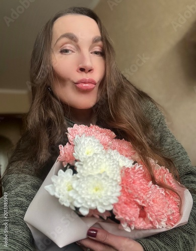 young woman with flowers