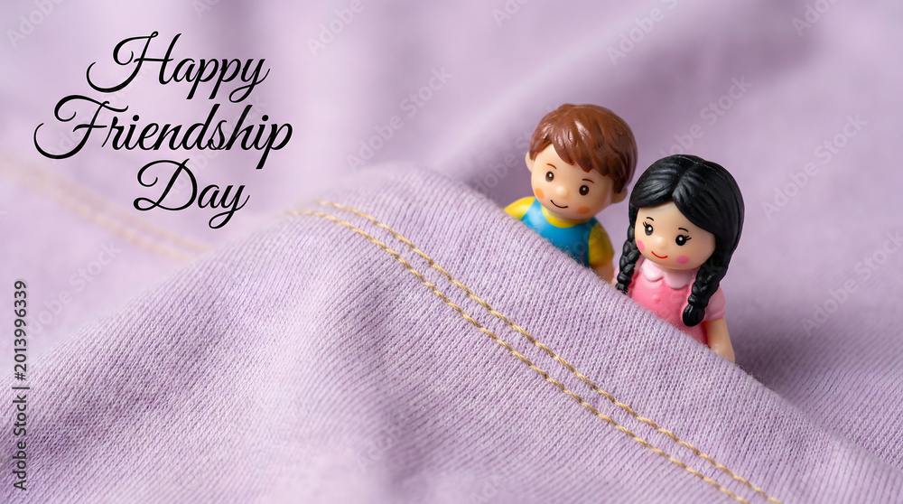 Obraz premium Happy friendship day toy figurines on fabric