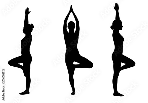 Black Silhouette of Woman Practicing Tree Pose Yoga Asana for Balance and Wellness