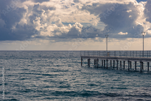 Wooden Pier in Limassol Cyprus under Stormy Sky