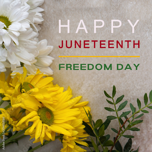 June 19. happy juneteenth freedom day. text with fresh flowers