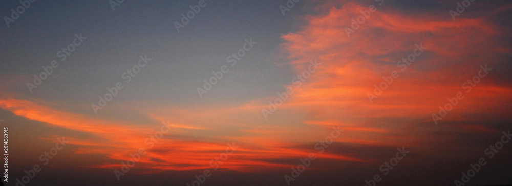 Fototapeta premium Banner Golden sky sunrise dramatic beautiful landscape view. Dawn sky gold dusk time cloudscape with sunlight. Panorama Dramatic sunset scenic landscape. Beautiful landscape nature with copy space