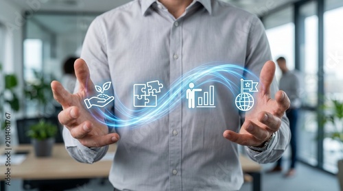 Man presenting business icons in office