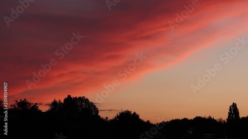 Dramatic Red Sunset Over German Town Skyline