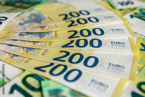 Φωτογραφία Close-up composition of euro money with different denominations including 100 and 200 euro bills