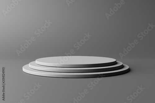 Konstfotografi Three tiered round podium pedestal platform on a neutral gray background for product showcase and stage display layouts