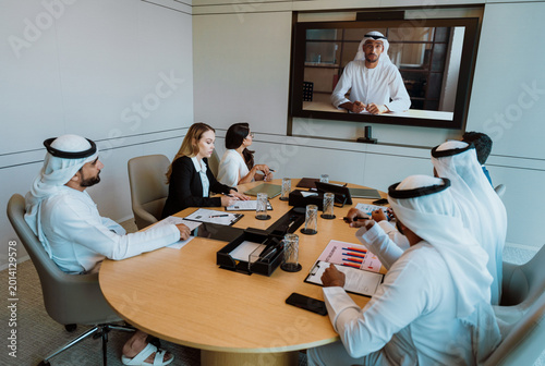 Bild auf Leinwand Middle eastern business people having conference meeting