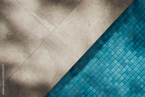 Luxury swimming pool with granite tiles and shadow light mockup template. Tropical summer background. Poolside aesthetic product placement. Minimal pool design for modern brand display