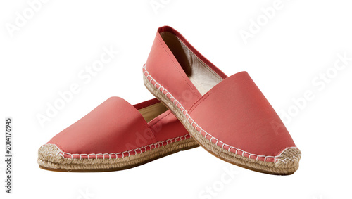 Canvastavla Isolated pair of casual coral-colored fabric espadrille shoes with braided jute