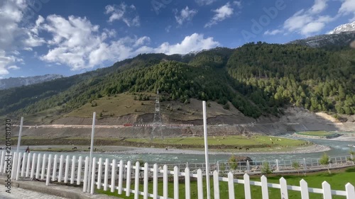 Mountain Resort Lawn with Outdoor Seating and Scenic Hills View