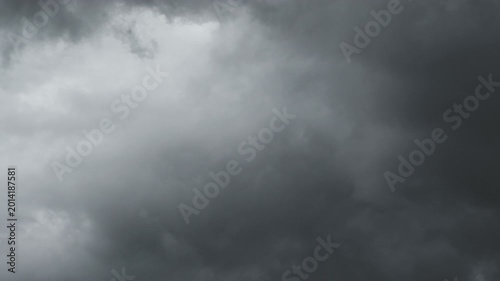 Dark storm clouds covering dramatic sky before rain. Timelapse video