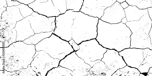 Fotografie Cracked, parched earth texture in black and white with bold fissures and dry, fragmented patterns—ideal for desert, drought, or climate crisis visuals in design, illustration, or concept art