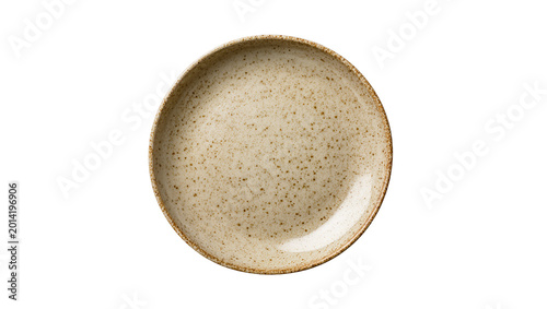 Fotografia Isolated round rustic stoneware plate with speckled textured surface, empty beig
