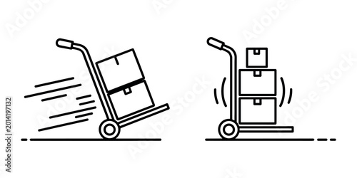 Obraz na plátně Two hand trucks with boxes one moving fast one stationary dolly trolley cart in