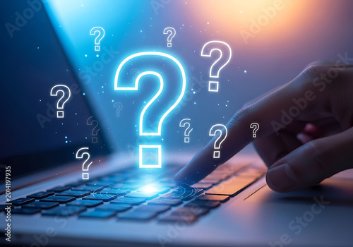 a hand interacting with a laptop keyboard, with multiple neon question marks floating around the screen. The image conveys a sense of inquiry or problem-solving.