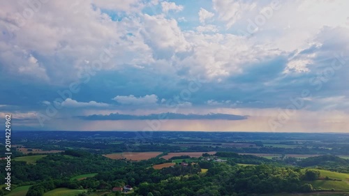 Experience a mesmerizing hyper lapse showcasing the stunning nature of France with rolling hills and clouds flowing gracefully
