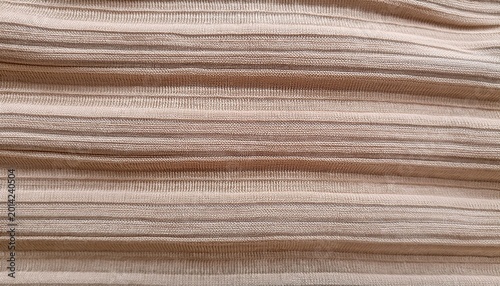 close up view of textured beige fabric with horizontal stripes showcasing woven patterns and fine details in a soft neutral color palette suitable for various design applications