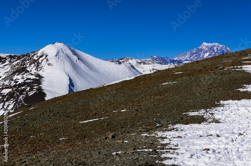 Photography ARPA, CHILE – Ski tracks mark the snowy volcanic terrain near Arpa, Chile, where freeride skiers seek untouched Andean powder in the remote backcountry