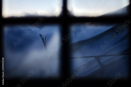 Εκτύπωση καμβά ARPA, CHILE – A view through the window of a mountain refugio frames the remote Andean landscape near Arpa, where backcountry travelers find shelter in the wilderness