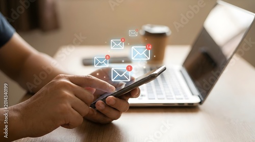 Mobile email marketing notification campaign with smartphone and laptop