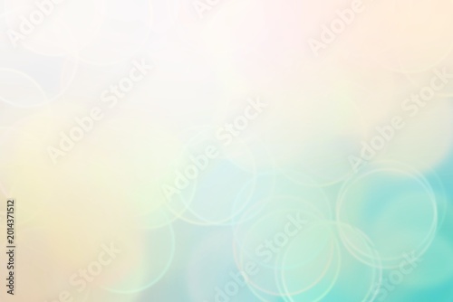 Abstract cream and blue bokeh background.