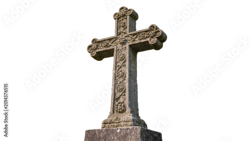 Isolated ancient ornate carved stone Christian cross memorial monument with intricate details