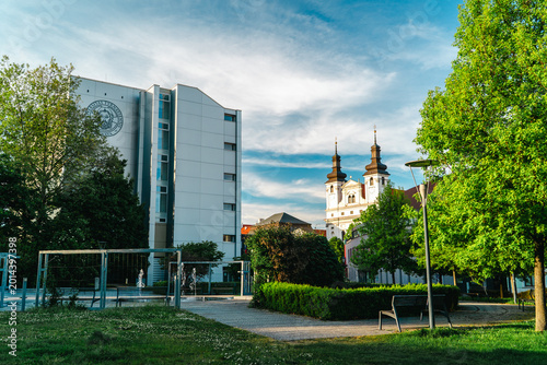 Фотография Green city park with cathedral towers in Trnava Slovakia