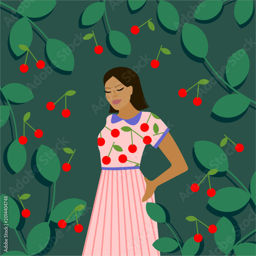Woman in dress with cherry pattern among cherry branches 