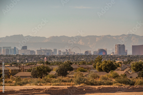  Las Vegas Nevada Skyline with Stratosphere Tower and Desert Mountain Backdrop from Daylight to Sunset and Night