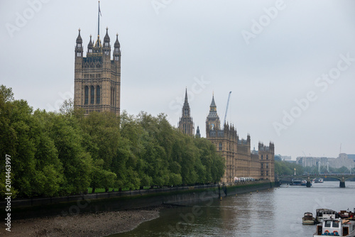 Fotografie Palace of Westminster and Houses of Parliament Reflected Along River Thames in