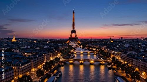 Paris Eiffel Tower sunset to night transition over Seine River. Iconic skyline aerial view with city lights illuminating for travel vlogs, European tourism, and holiday marketing.
