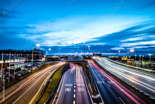 Obraz na płótnie Joe Williams Bridge in Dublin Ireland at Blue Hour with Traffic Light Trails and