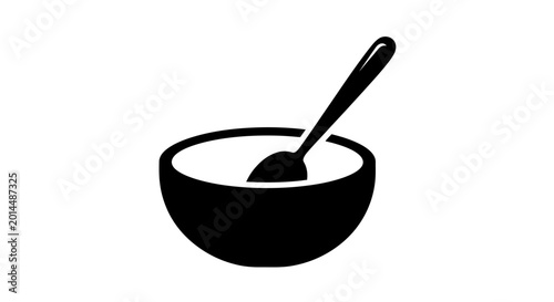 Foto Bowl with spoon acts as a universal culinary symbol representing home cooking, nutritious meals, healthy eating habits, and the daily comfort of preparing simple food for family members