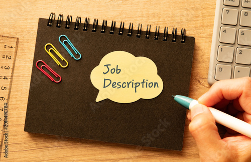 Corporate and management concept of Job Description represented on speech bubble with clips, calculator, pen. Professional business leadership and operations.