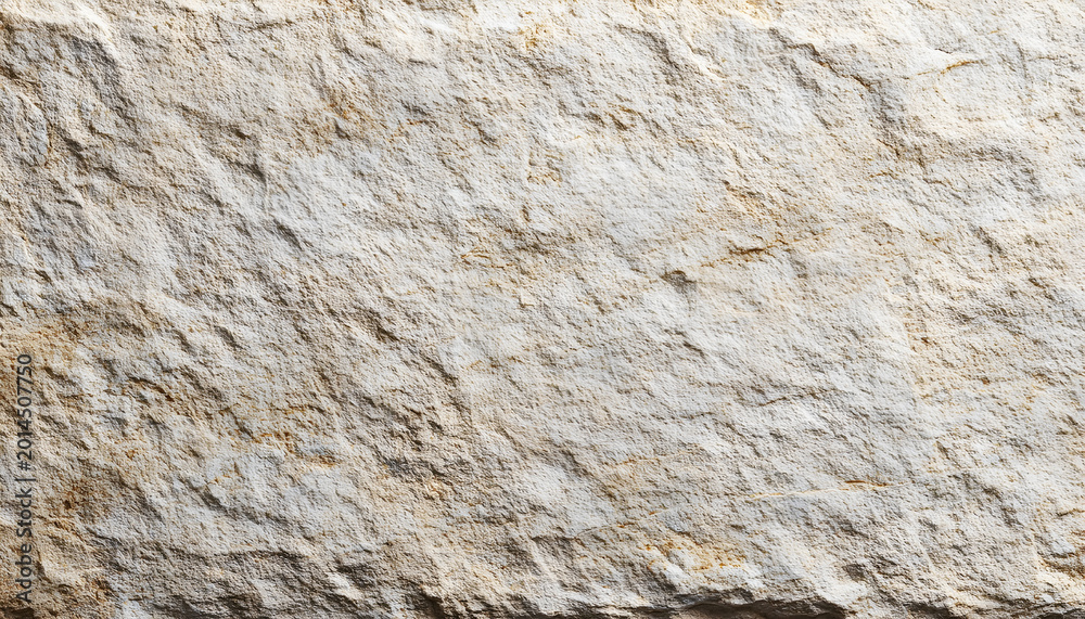 Naklejka premium Textured limestone block captured on an empty blank background with subtle highlights