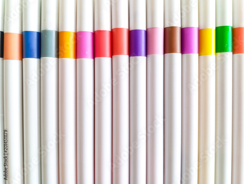 Bright colorful marker pens in minimal composition