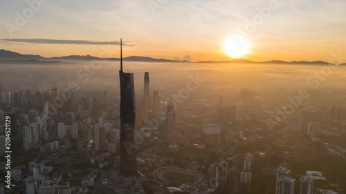 Aerial view time lapse 4k video of Kuala Lumpur city center view during dawn overlooking the city skyline in Federal Territory, Malaysia. 